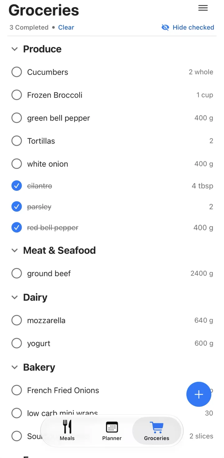 The shared grocery list grouped into Produce, Meat and Seafood, Dairy and Bakery, with a few items checked off
